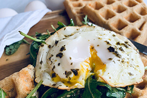 savory waffles with arugula and egg