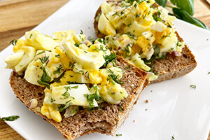 egg salad with herbs on toast